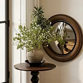 Natural Floral Arrangement In Rustic Vase On Wooden Table With Round Mirror