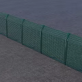 Green Metal Wire Mesh Fence Along Gray Ground For Outdoor Security