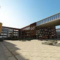 Modern Campus School Building With Multi Story Structure Green Playground And Lush Trees