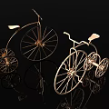 Vintage Metallic Bicycles With Large Front And Small Rear Wheels On Reflective Surface