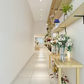 Bright Flower Shop Interior With Wooden Table Stools And Shelves Of Fresh Bouquets