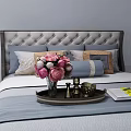 Double Bed with Tufted Gray Headboard Blue Gray Bedding Multiple Pillows and Tray with Flowers 3d model