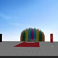 Colorful Fountain Launch Device With Flower Display And People Silhouettes Under Blue Sky