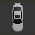 Sleek Modern Silver Sedan With Black Roof And Stylish Black Wheels