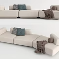 Beige Sectional Sofa With Patterned Cushions Green Pillow And Brown Throw Blanket 3d model