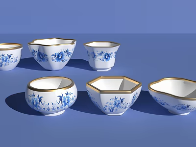 Blue and White Ceramic Wares with Gold Trim and Floral Patterns on Blue Background 3d model