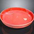 Vibrant Red Hand-Carved Pottery Sculpture Carving Bowl With Glossy Surface And Textured Details