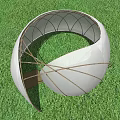 White Dome Structure With Golden Arched Supports On Green Grass Under Blue Sky