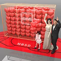 Red Heart Balloons Decor Grid Frame With LOVE Sign Woman And Child Near MBS Logo