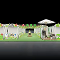 Modern Commercial Street With White Buildings Shops Green Spaces And Open Plazas