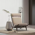 Contemporary Beige Lounge Chair With Upholstered Seat Wooden Frame Side Table Plant And Area Rug