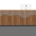 Modern Light Wood Reception Desk With Computer Monitor And Accompanying Chair