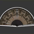 Traditional Hand Fan With Intricate Brown Orange Patterns And Black Frame White Trim