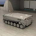 Large Tracked Utility Vehicle with Overland 1001 Marking Parked in Hangar Area