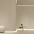 Textured Neutral Wall in Modern Interior with White Sphere Small Potted Plant and LED Lighting