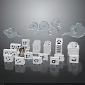 Various White Electronic Appliances Arranged With Decorative Clouds And Small Figurine