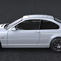 White BMW Two Door Coupe With Sporty Design And Black Wheels