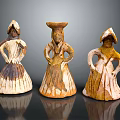 Traditional Terracotta Figurines With Dresses Hats And Earth Toned Details On Black