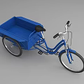Blue Three Wheeled Bicycle With Cargo Basket And Black Seat