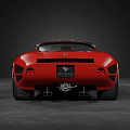 Red Classic Vintage Sports Car With Streamlined Body And Gold Wheels