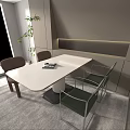Modern Dining Table Set With White Surface Green Chairs And Plant In Minimalist Indoor Space