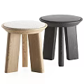 Modern Round Wooden Stools With White Upholstered Seats In Light Dark And Black Tones