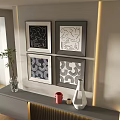 Four Black And White Patterned Frames On Wall With Decorative Vase And Shelf 3d model