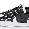 Nike Black And White Low Top Sneakers With White Sole And Lace Up Design