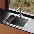 Stainless Steel Black Basin Kitchen Sink With Drainer Rack And Faucet On Countertop By Window