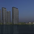 Modern High Rise Residential Buildings Along Waterfront With Blue Sky Reflection