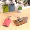 Stylish Jewelry Storage Cases In Green Blue Pink Leather With Decorative Plants