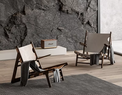 Wooden Frame Leisure Chairs with Blankets on Stone Wall Background and Wooden Floor 3d model