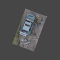 Blue Truck Parked On Muddy Ground With Tools And Equipment