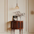 Classic Wooden Entryway Console Table With Carved Details And Decorative Branches