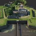 Historic Fortress City Architecture With Green Grass Water Moat And Stone Walls