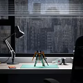 Robot Figure On Office Desk With Desk Lamp Green Mouse Pad And City Skyline View