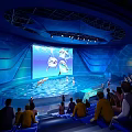 Indoor Amusement Park Dolphin Show With Pool Performance Audience Watching Blue Lighting