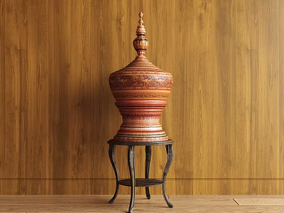 Red And Orange Carved Sculpture On Black Metal Stand With Wooden Wall Background 3d model