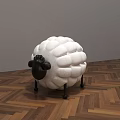 Sheep Shaped Stool With White Body And Black Legs Head On Herringbone Wooden Floor