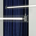 Modern Linear Pendant Light With Sleek Metal Frame Against Navy Blue Curtains And White Background