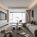 Modern Living Room Interior With Gray Sofa Round Coffee Table Floor Lamp TV Cabinet And Green Plant
