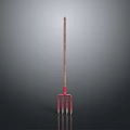 Red Garden Fork With Wooden Handle And Three Tines For Plant Care