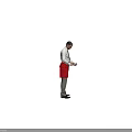 Man in White Shirt Black Tie and Red Apron Holding Device Against Gray Background