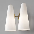Modern Wall Sconce With White Conical Shades And Brass Bracket Mounted On Gray Wall