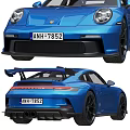 Blue Porsche Sports Car Front And Rear Views