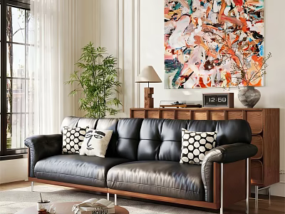 Black Leather Multi Person Sofa With Black White Patterned Pillows Abstract Painting And Green Plant 3d model