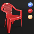 Red Plastic Leisure Chair with Perforated Back and Colorful Balls on Black Background
