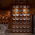 Elegant Traditional Interior With Woven Chandelier Stone Basin Ceramic Vases And Decorative Items