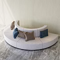 Curved Irregular Sofa With Light Fabric And Decorative Pillows In Modern Interior