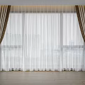 Elegant Curtains With Sheer Layers Brown Trim City View Wooden Floor Green Plant